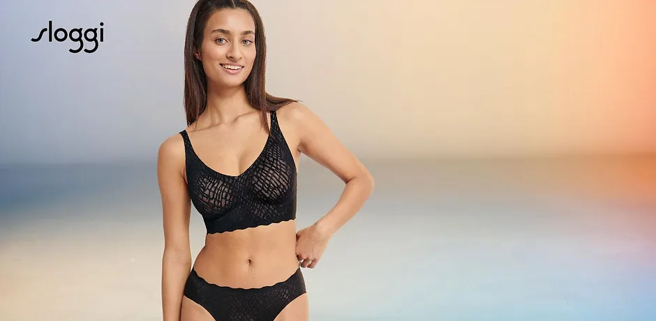 Elegante reggiseno in pizzo nero e slip coordinato: intimo femminile per donne attente allo stile.