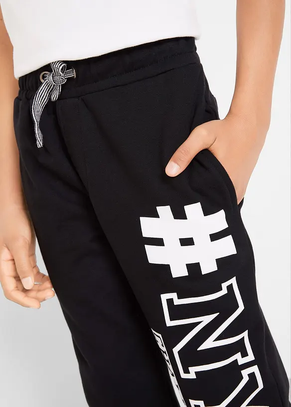 Pantaloni in felpa con stampa, bonprix