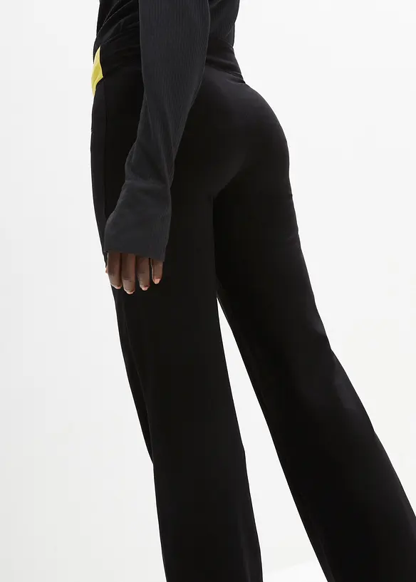 Pantaloni sportivi in cotone, svasati, bonprix