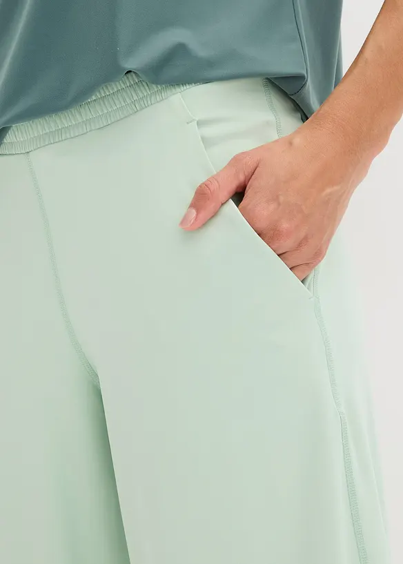 Pantaloni sportivi comodi con gambe larghe, ad asciugatura rapida, bonprix