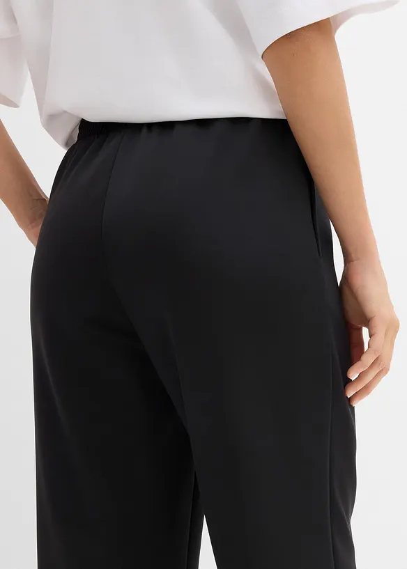 Pantaloni da jogging in tessuto effetto neoprene, bonprix
