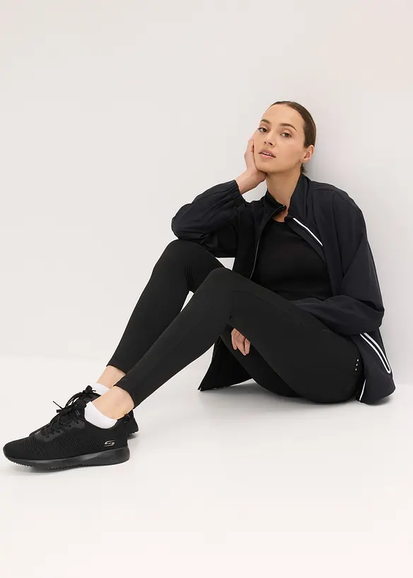 Leggings termici con dettagli riflettenti e tasca per il cellulare, bonprix