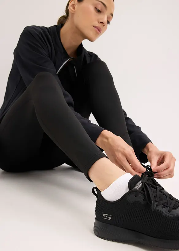 Leggings termici con dettagli riflettenti e tasca per il cellulare, bonprix