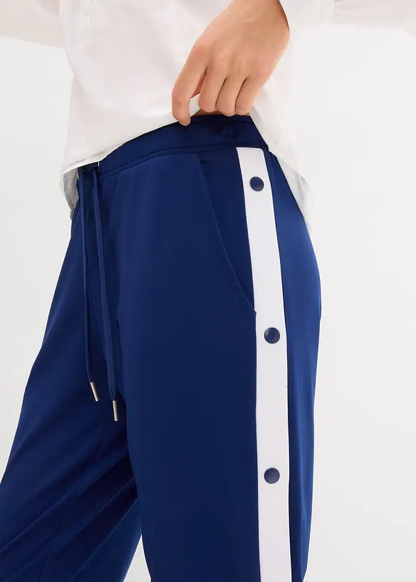 Pantaloni da jogging ad asciugatura rapida con bottoni automatici, bonprix
