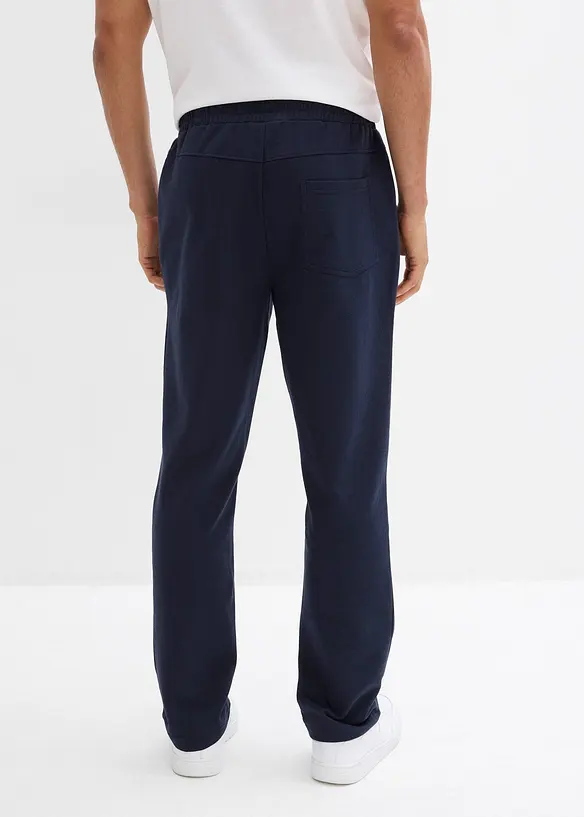 Pantaloni da jogging con pratiche tasche zippate, bonprix