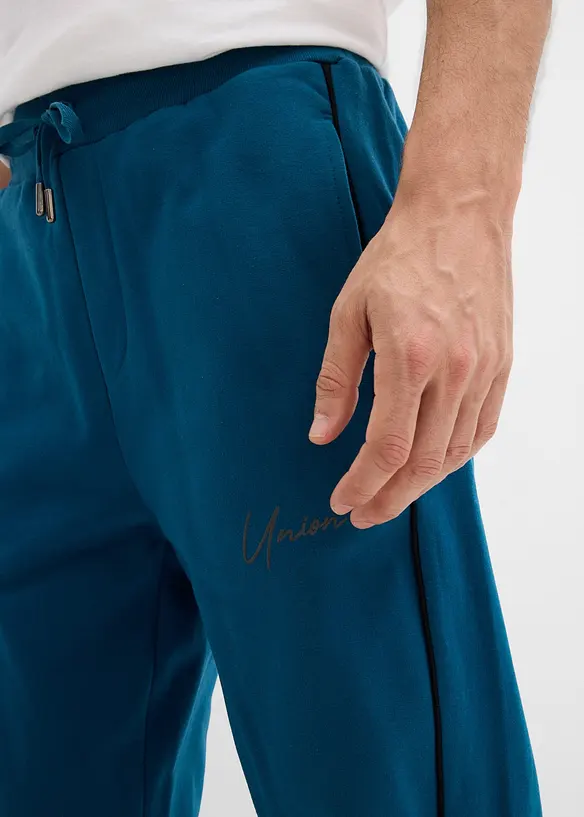 Pantaloni in felpa con dettagli a contrasto in puro cotone, bonprix