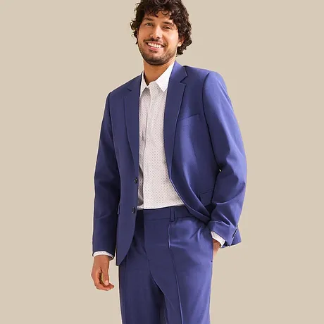 Giacca elegante scura con pantaloni coordinati. 