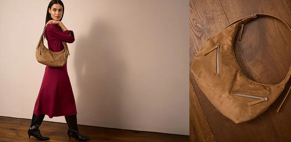 Elegante abito rosso bordeaux, abbinato alla borsa in pelle marrone.