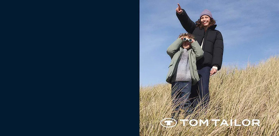 Le calde giacche invernali e i maglioni di Tom Tailor proteggono dal freddo nel ventoso paesaggio con dune.