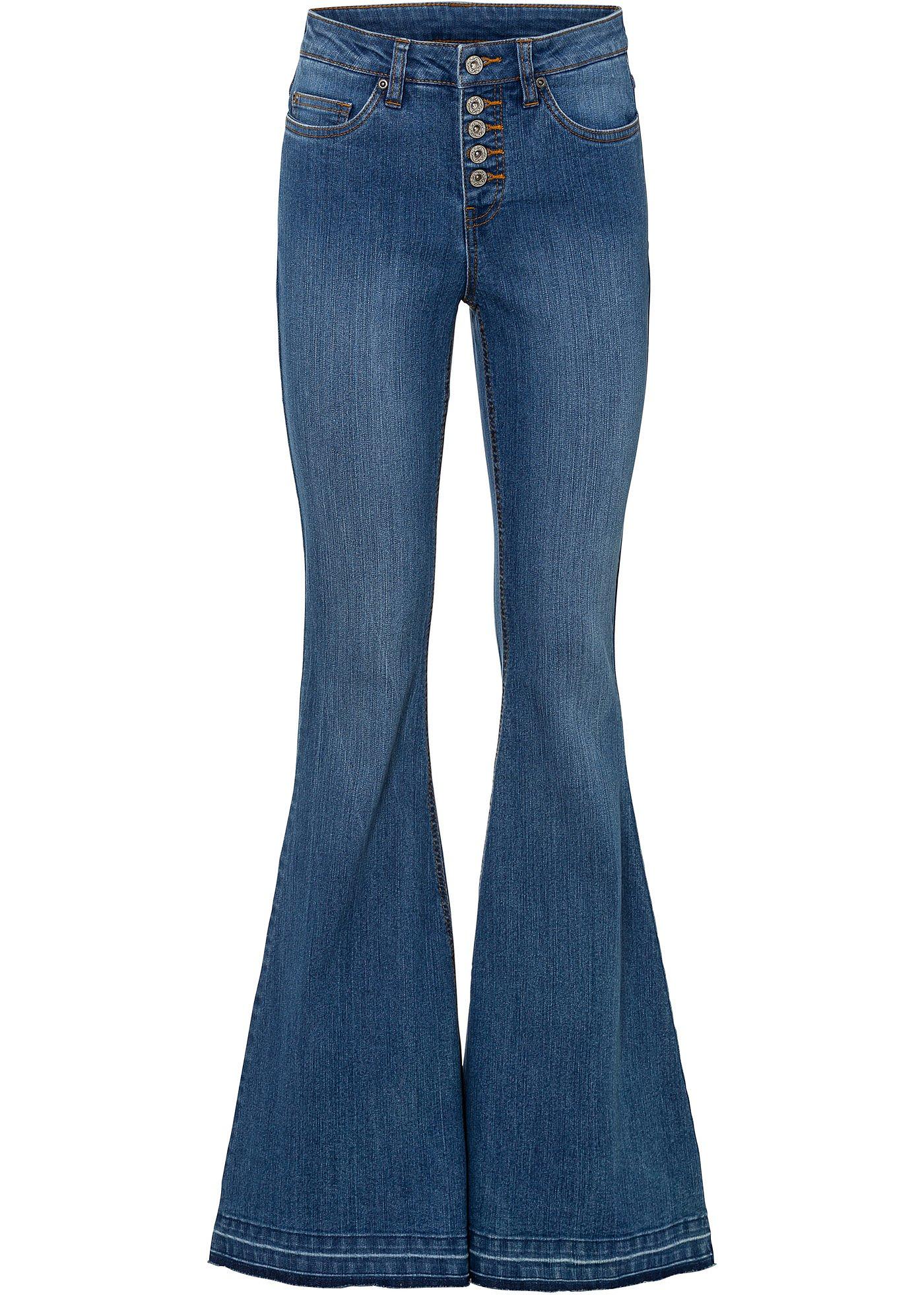 Jeans a zampa con orlo aperto