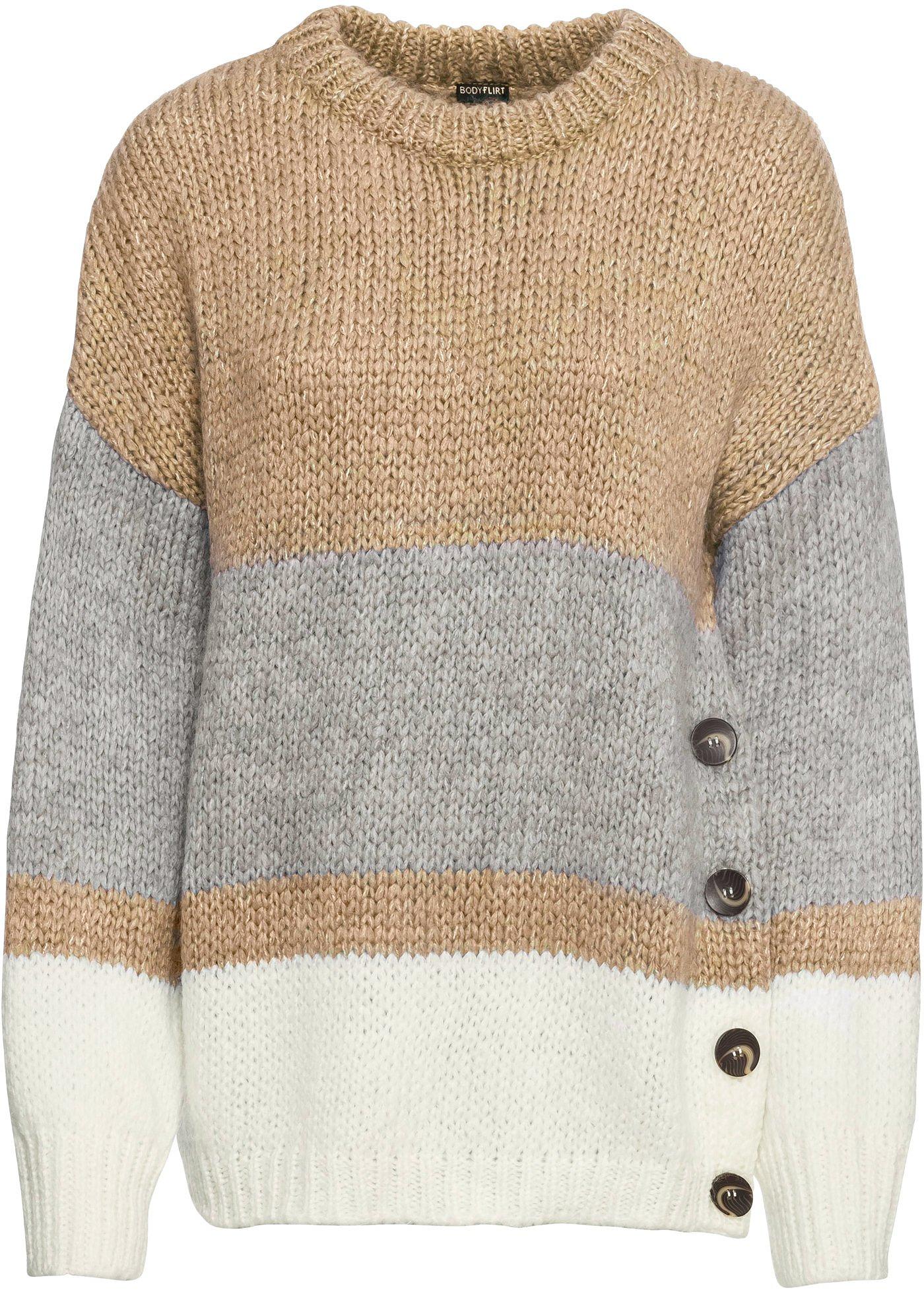 Maglione oversize a righe con bottoni