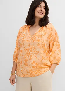 Top tunica asimmetrico in maglia: abbigliamento oversize all'avanguardia per taglie forti - Italia