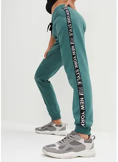 Pantaloni in felpa con elastico in vita e stampa con scritta, bonprix