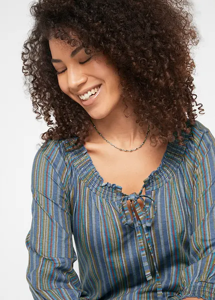 Bellissima maglia lunga a righe con maniche a 3/4