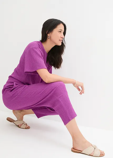 Pantaloni in jersey alla caviglia con effetto modellante grazie alla fascia  alta in vita