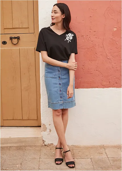 Gonna di jeans ricca di fascino con bottoni e tasche applicate