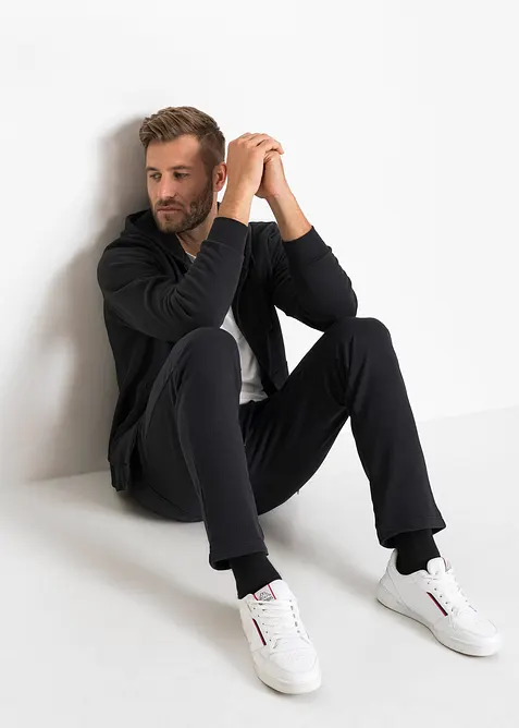 Pantaloni da jogging con pratiche tasche zippate, bonprix