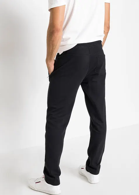 Pantaloni da jogging con pratiche tasche zippate, bonprix