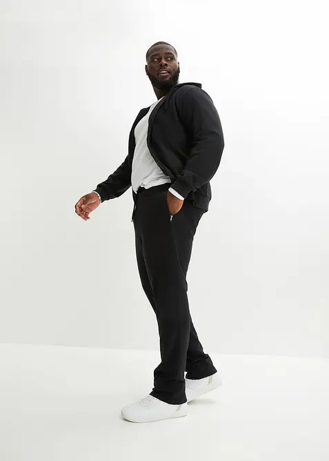 Pantaloni da jogging con pratiche tasche zippate, bonprix