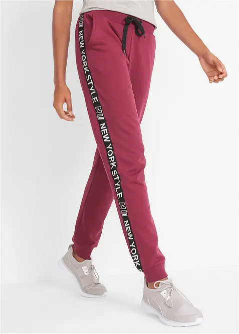 Pantaloni in felpa con elastico in vita e stampa con scritta, bonprix
