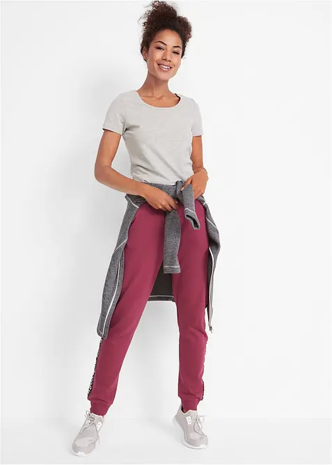 Pantaloni in felpa con elastico in vita e stampa con scritta, bonprix