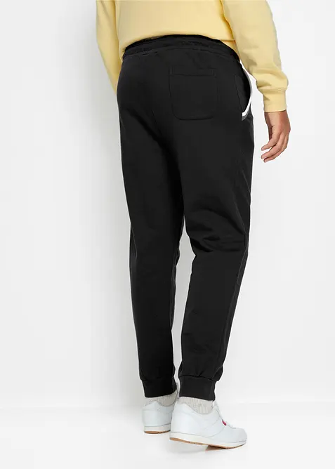 Pantaloni da jogging con dettagli a contrasto in puro cotone, bonprix