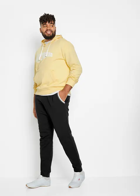 Pantaloni da jogging con dettagli a contrasto in puro cotone, bonprix
