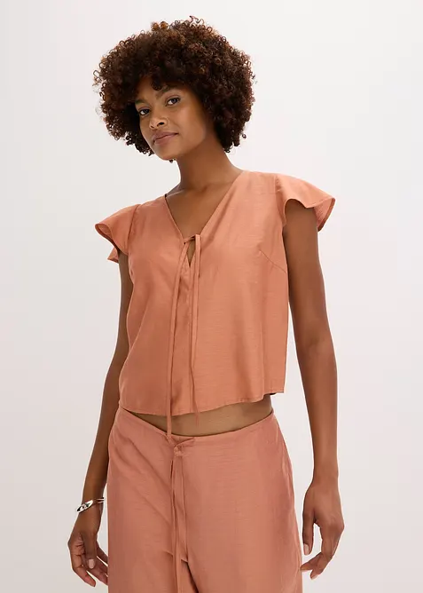 Blusa con effetto lucido e maniche a volant, bonprix