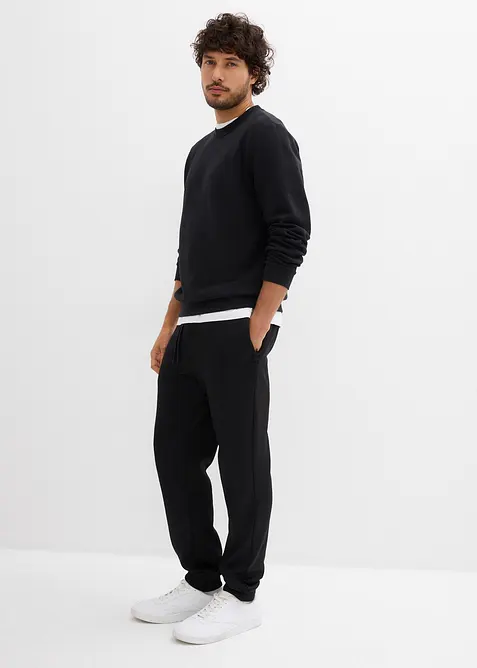 Pantaloni da jogging termici con pratiche tasche zippate, bonprix