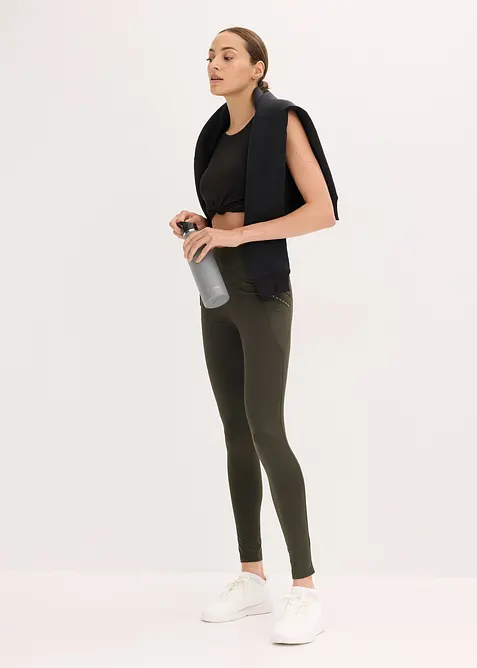 Leggings termici con dettagli riflettenti e tasca per il cellulare, bonprix