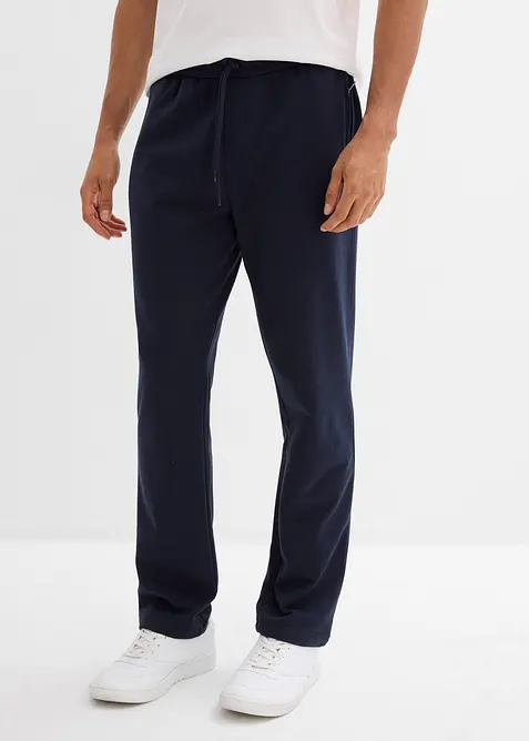 Pantaloni da jogging con pratiche tasche zippate, bonprix