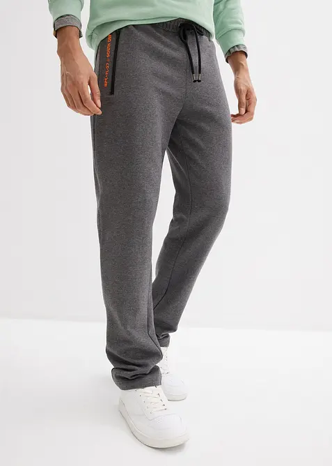 Pantaloni da jogging in cotone biologico con pratiche tasche zippate, bonprix