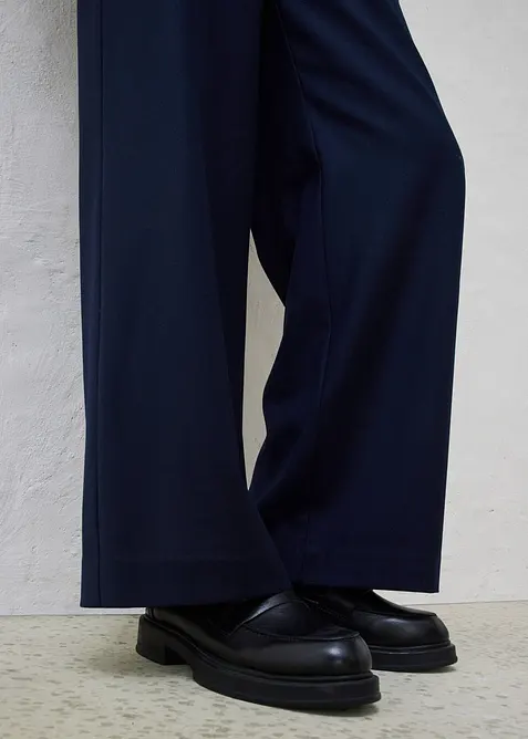 Pantaloni 5 tasche larghi con lana, bonprix