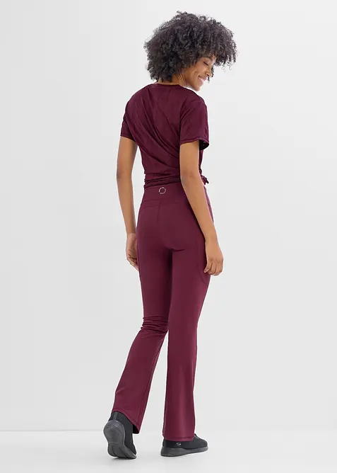 Leggings sportivi comodi e svasati con tasca per il cellulare, asciugatura rapida, bonprix