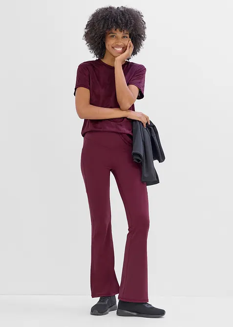 Leggings sportivi comodi e svasati con tasca per il cellulare, asciugatura rapida, bonprix