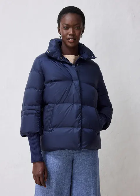 Piumino con piume riciclate e maniche di maglia, bonprix
