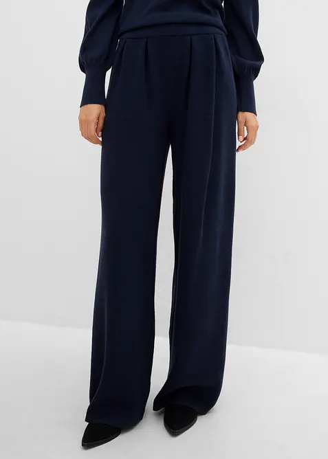 Pantaloni in filato fine con gambe svasate, bonprix