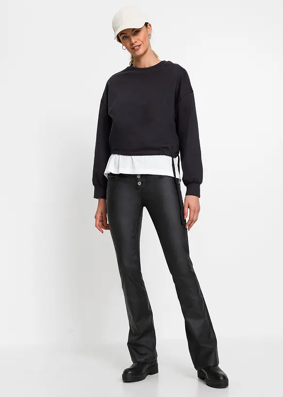 Pantaloni in similpelle a zampa, bonprix