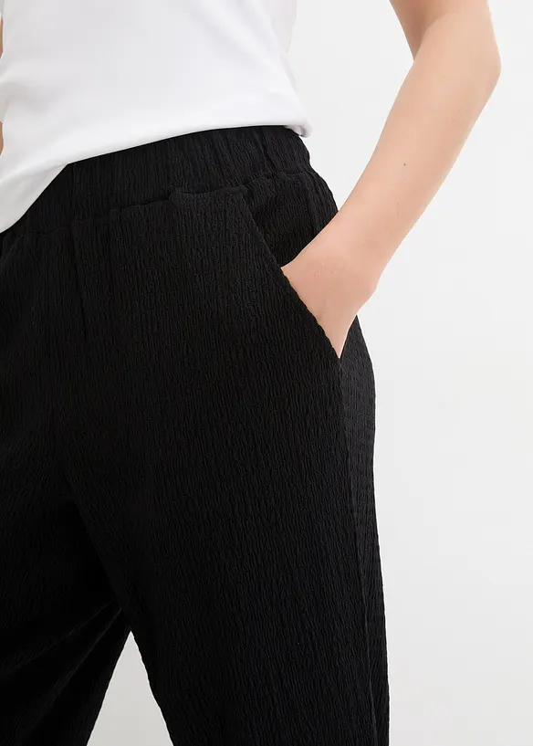 Pantaloni larghi in jersey operato, bonprix