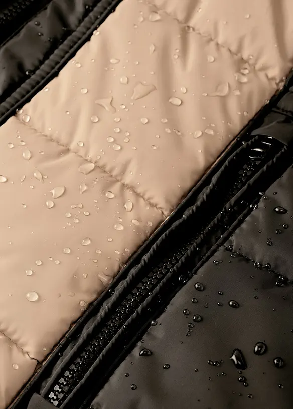 Giubbotto outdoor idrorepellente con pelliccia sintetica, bonprix