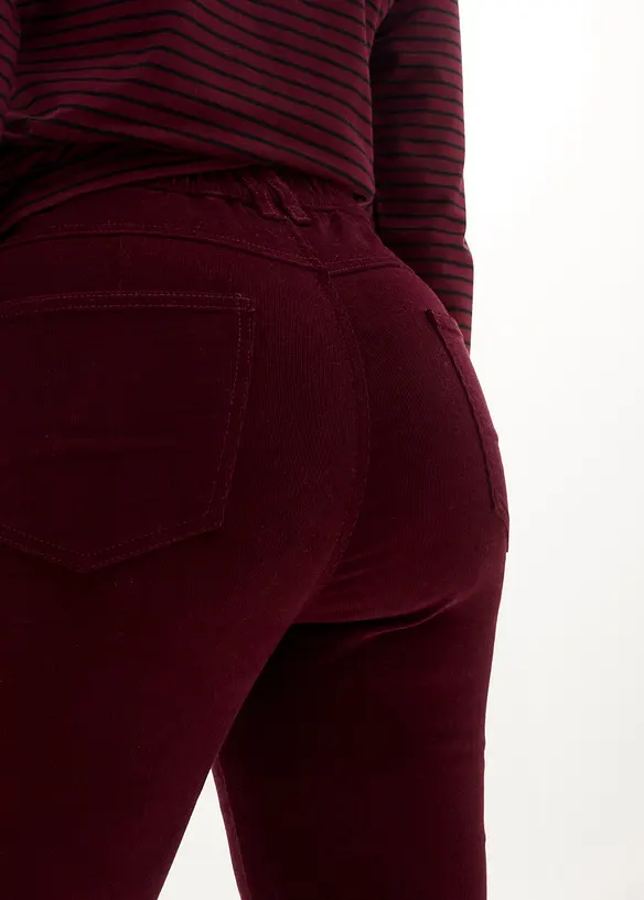 Pantaloni a zampa in velluto elasticizzato con cinta comoda a vita alta, bonprix