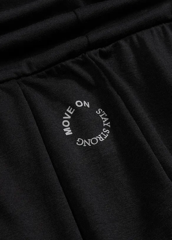 Pantaloni sportivi larghi con fascia in vita risvoltabile, bonprix