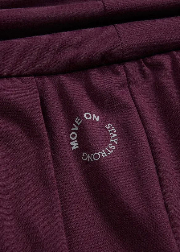 Pantaloni sportivi larghi con fascia in vita risvoltabile, bonprix