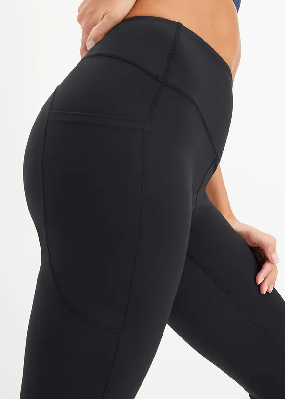 Leggings sportivi comodi con tasca per il cellulare, svasati, bonprix