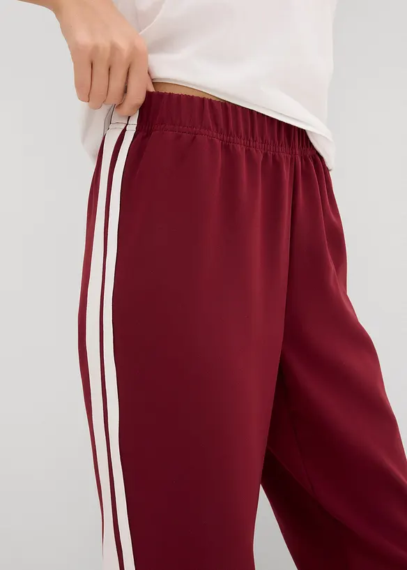 Pantaloni da jogging con strisce laterali, bonprix