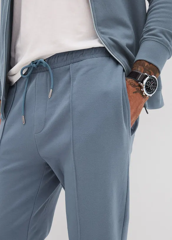 Pantaloni in felpa con piega cucita, bonprix