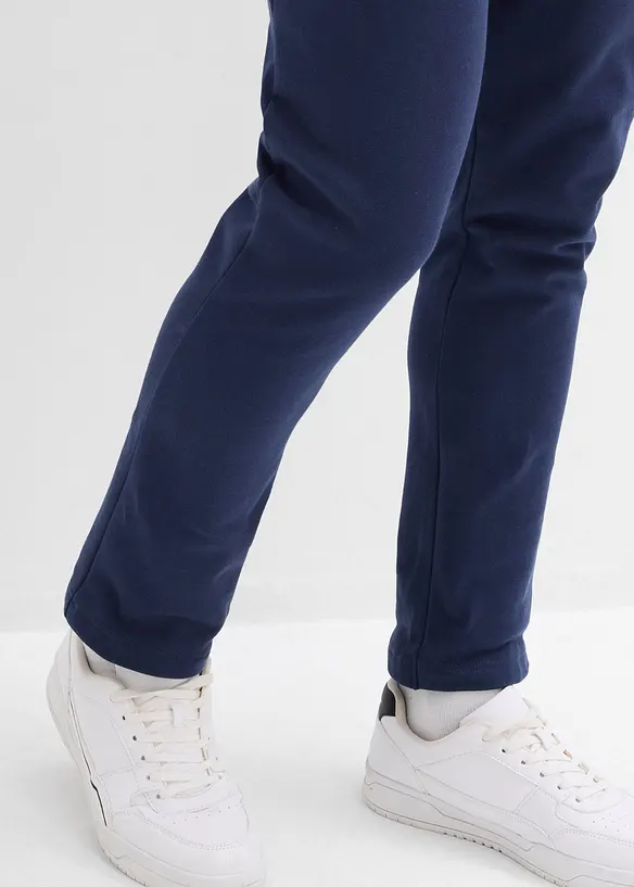 Pantaloni da jogging in cotone biologico con pratiche tasche zippate, bonprix