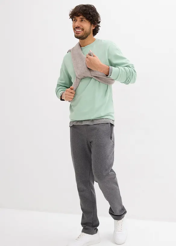 Pantaloni da jogging in cotone biologico con pratiche tasche zippate, bonprix