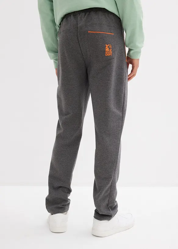 Pantaloni da jogging in cotone biologico con pratiche tasche zippate, bonprix