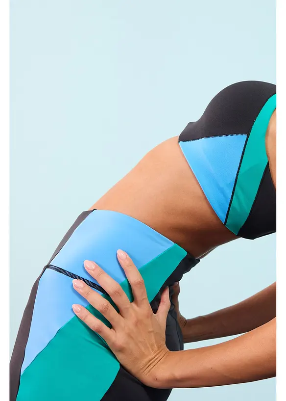 Reggiseno sportivo imbottito con sostegno medio, bonprix